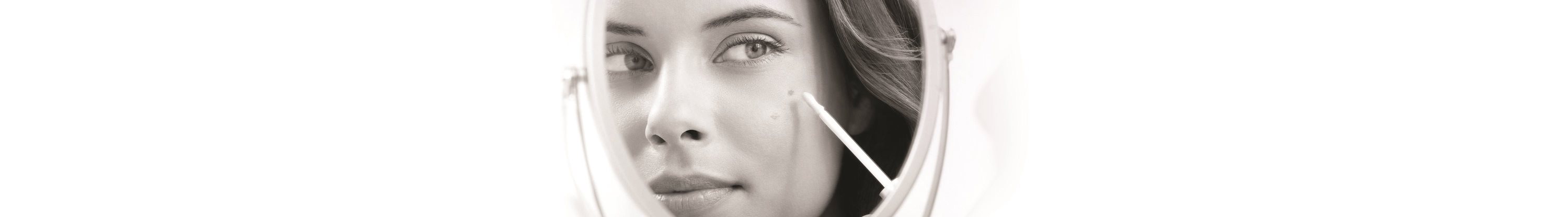 Eucerin modelo está usando ponto corrector contra manchas escuras